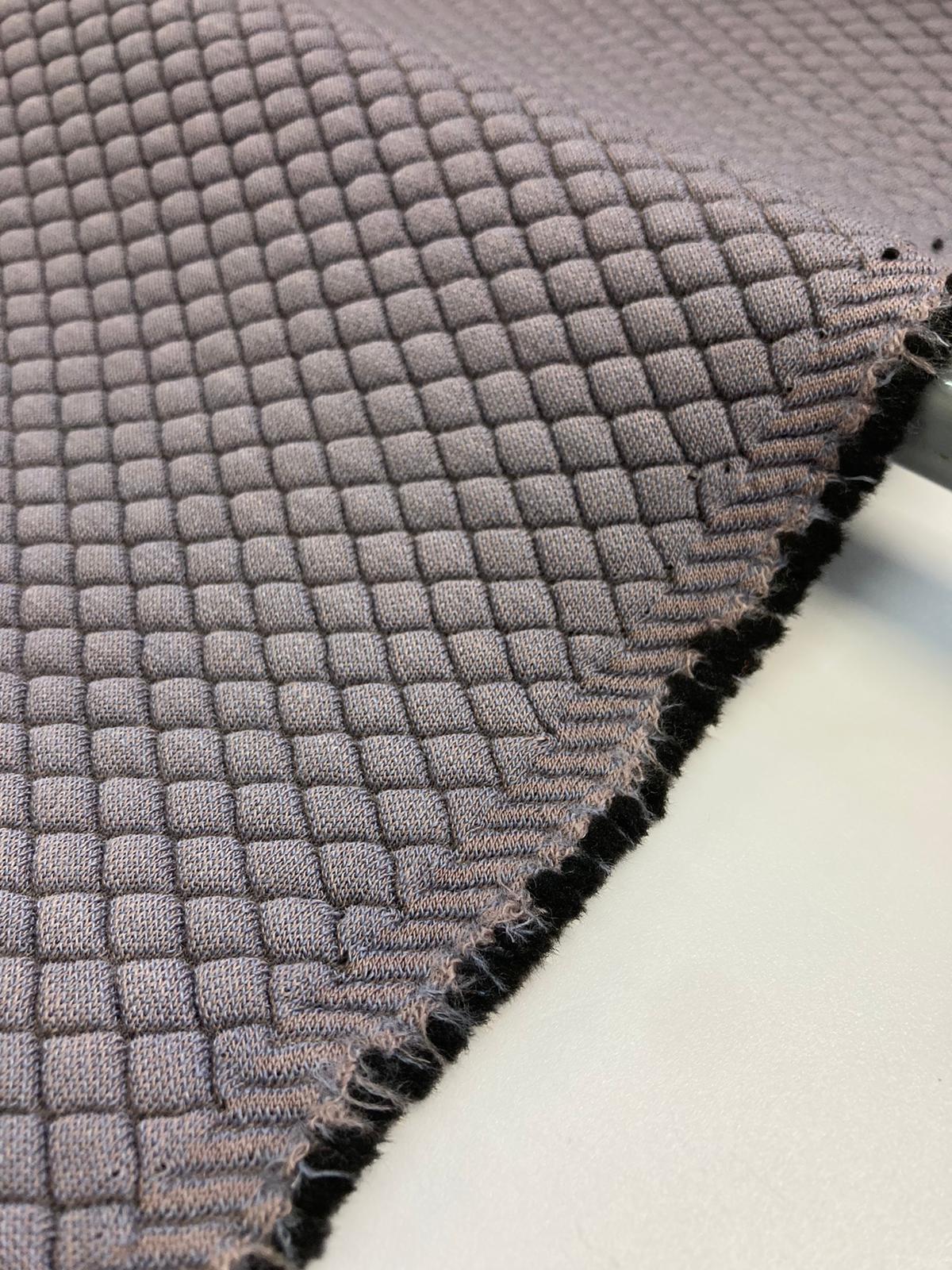 Designed by Kvadrat Febrik  Mosaic 2 a knitted three-dimensional upholstery textile